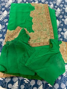 a green with golden heavy work