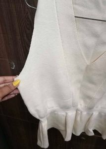 White Sleeveless V-Neck Top