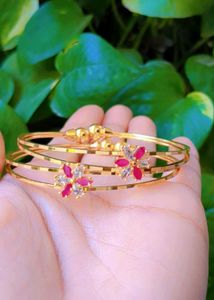 Floral Design Gold Bangles