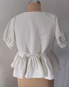 White Peplum Top