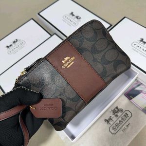 COACH Small Wristlet in Signature Canvas WD BOX