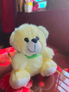 Cute Yellow Teddy Bear with Green Ribbon