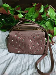 Cute mauve satchel with gems