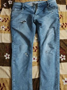 Distressed Denim Jeans