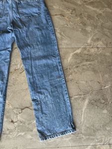 Ripped Blue Denim Jeans