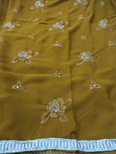 Floral Embroidered saree with stiched blouse