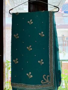 Pearl Bloom – Elegant Teal Saree