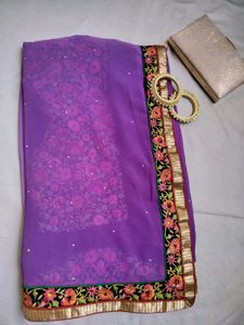 Elegant Purple Embroidered Saree