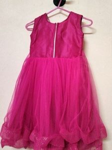 Pink Net Dress With Proper Lining Inside.