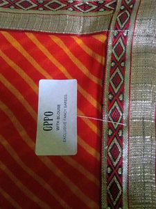 Orange Leheriya Saree with Embellished Border
