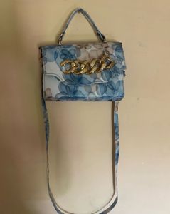 FLORAL PRINT SLING BAG