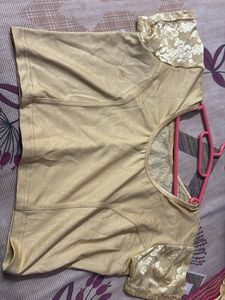 Golden Blouse with Floral Accents