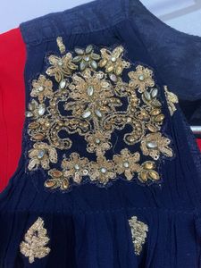 red umbrella long gown with designer cap full part