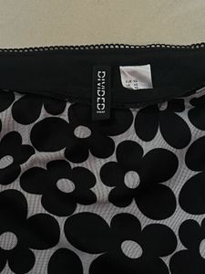 Divided Black Floral Mini Skirt