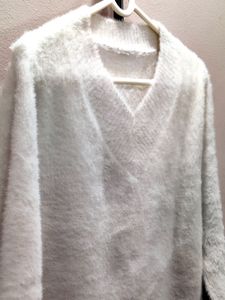 premium imported white V-neck mohair sweater.