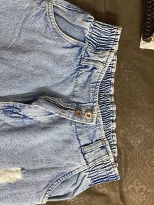 Distressed Denim Jeans