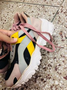 Well-loved Pink Sneakers