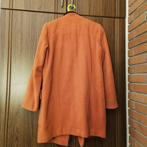 orange statement coat 🧥