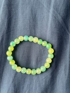 Beaded Bracelets In The Colours Green And Ochre
