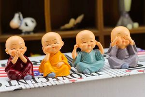 Cute Bhuddha Statues (Set Of 4)