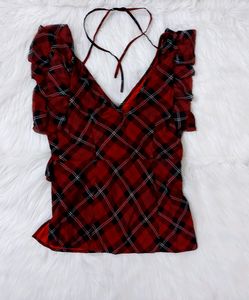 Sleeveless Ruffle Top With String In The Back
