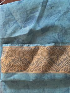 Blue Net Saree With Cream Border