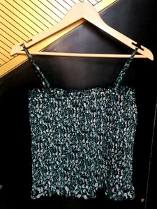 Smocked floral green sleeveless crop top