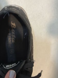 Bata Black Polka Dot Slip-on Sneakers