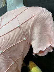 Pearl Lattice Ruffle Knit Top