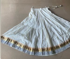 Fix price cream and golden skirt