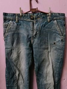 Distressed Blue Denim Jeans
