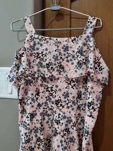 peach and black colored evening gown