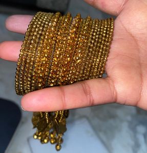Thin Girl Golden Petal Jhumer Bangles