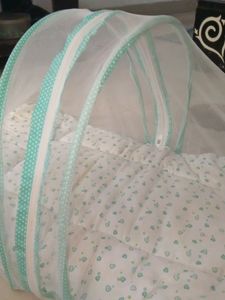 Baby Bed. With Net Covering .