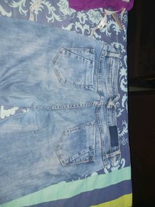 Distressed Denim Jeans