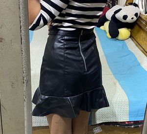 Set of 2 shoulder fitted top and leather skirt