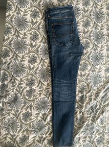 Distressed Denim Jeans