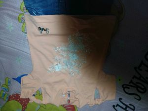 two baby girl dresses are there