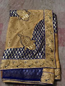 Elegant Gold and Blue Saree