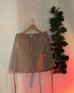 Short Gorgeous Ruched Leather Skirt On The Sides
