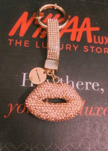 mac lip gold keychain