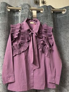 Ruffled Tie Neck Blouse