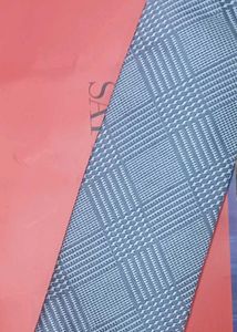 Satya Paul tie with an Amity tag. New.