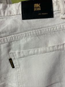 : Ivory Flow Wide-Leg Jeans