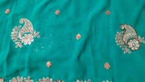 Elegant rama colour Embroidered Saree