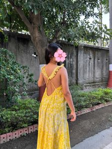 backless yellow flowy sundress