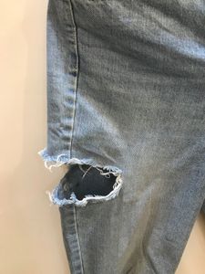 Ripped Light Wash Denim Jeans