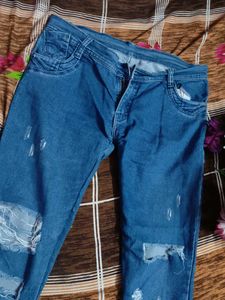 Ripped Blue Denim Jeans