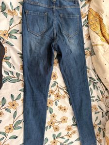 Ripped Knee Denim Jeans