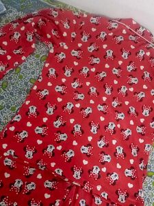 a red night suit gives cozy vibe wth detailings of